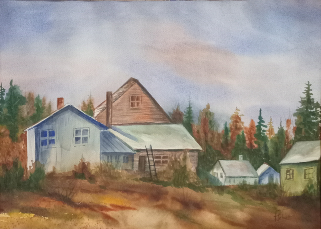 A cluster of rustic buildings nestled among a mix of evergreen and autumn-colored trees A cluster of rustic buildings nestled among a mix of evergreen and autumn-colored trees